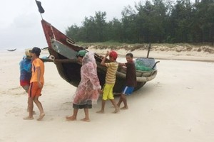 Local fishing vessels are moved to safe place to avoid the bad weather