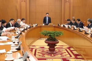 Vietnam Deputy PM cum Minister of Foreign Affairs Pham Binh Minh chairs a summarization conference about activities of the National Steering Committee for the VN-Laos Solidarity and Friendship Year and the VN-Cambodia Friendship Year