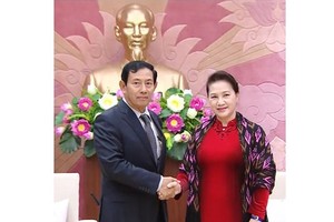 Chairwoman of the National Assembly of Vietnam Nguyen Thi Kim Ngan receives chairman of the Union Solidarity and Development Party U Than Htay
