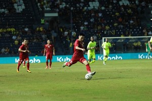 Midfielder Duc Huy (No. 15) equalised for Vietnam at the 83rd minute (Photo: VNA)