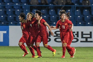 Vietnamese women celebrate their victory over Thailand at the Asian Games in August 2018 (Photo: VNA)