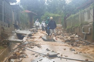 Heavy downpours trigger soil and rock downslope