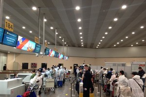 Passengers check in at the airport of Moscow