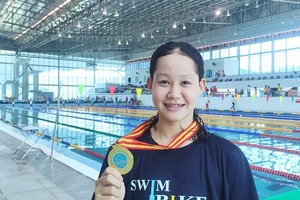 The 14-year old swimmer Vo Thi My Tien 
