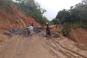 Debris in the path to Defense Economics Division 337 landslide has been removed