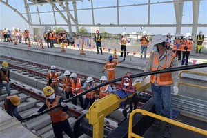 Cable pulling work on HCM City's Metro Line No 1 (Photo: VNA)