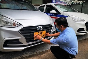 HCMC changes yellow license plates for over 31,000 business vehicles