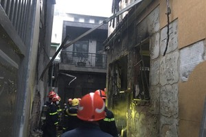 8 people found dead after huge fire in District 11 