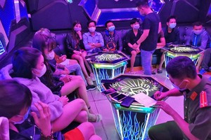 Two karaoke parlors fined, revoked business licenses for breaking Covid-19 rules