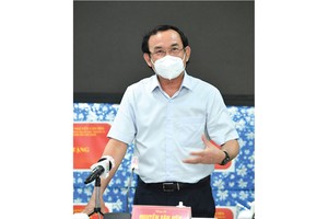 HCMC residents prepare to live with Covid-19 under new-normal state