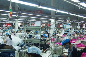 HCMC builds plan to take care of Covid-19 hit workers during Tet holiday 