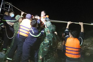 Three men trapped in foot of hydroelectric dam rescued 