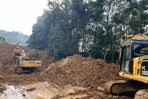 Over 20,000 cubic meters of rock, soil slide onto National Highway 9C