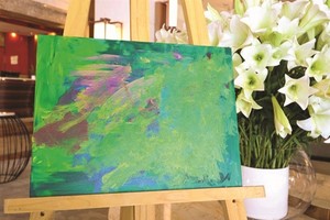 Fund-raising exhibition presents paintings by children with autism