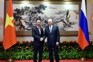President Thuong meets with Russian counterpart Putin in Beijing