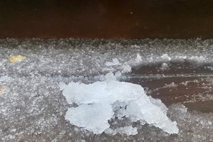 Ice buildup appears at Fansipan peak after surprise hailstorm