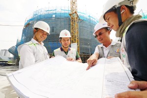 Busy working atmosphere on construction sites of key transport projects