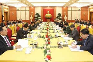Top leaders of Vietnamese, Lao Parties meet in Hanoi