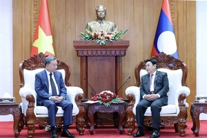 Vietnam, Laos treasure great friendship, special solidary
