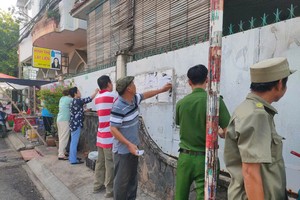 Over 16,000 people join illegal advertisement removal in HCMC
