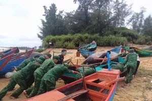 Residents evacuated to shelters, airport shut down to avoid storm in Quang Binh