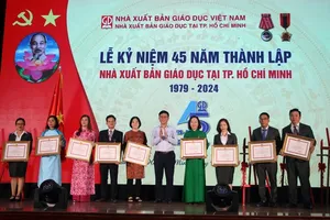 Education Publishing House in HCMC awarded 1st Class Labor Medal by Laos