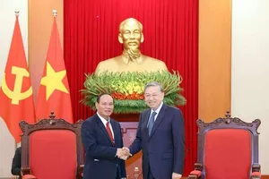 Party chief welcomes Lao Deputy PM, Minister of Public Security