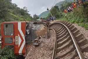 Freight train hits stalled truck, derails in central Vietnam