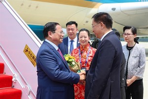 Vietnamese PM arrives in Tianjin for WEF meeting, working visit to China