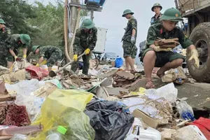 Flood-stricken residents step up preparedness as typhoon No.15 approaches