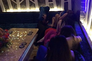 Dozens of female waitresses in the restaurant. (Picture: DAN NGUYEN)