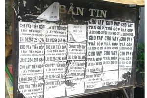 Bảng thông tin khu phố thành nơi quảng cáo tín dụng đen