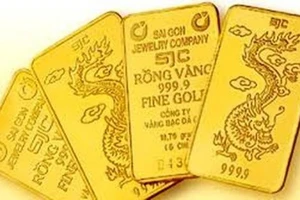 Vàng, ngoại tệ giảm, chứng khoán tăng sau khi FED giảm lãi suất