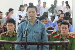 被告人阮友申在法庭上回答公訴人訊問。（圖源：E.X）