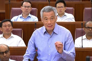 新加坡總理李顯龍當日在國會上發表題為“歐思禮路38號：濫用權力的指控”的聲明。（圖源：AFP/GETTY IMAGES）