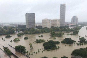 得克薩斯州休斯敦市可見市區全被颶風所帶來的洪水、雨水淹沒。（路透社）