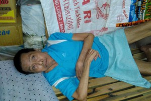 患上精神病和半身不遂的黃孟平。