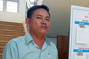 圖為達樂省克隆阿納縣廣田鄉公安長黎晉盛。（圖源：西源）