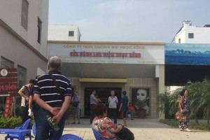 被暫停營業的玉龍商店。（圖源：Vietnamnet）