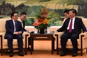 中共中央總書記習近平親切接見越南共產黨中央總書記阮富仲的特派員-黨中央委員、中央對外聯絡主任黃平軍同志。（資料圖源：越通社）