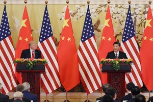 中國國家主席習近平（右）與美總統特朗普在北京人民大會堂共同會見記者。（圖源：互聯網）