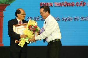 溫陵會館常務副理事長洪世真榮獲三等勞動勳章。