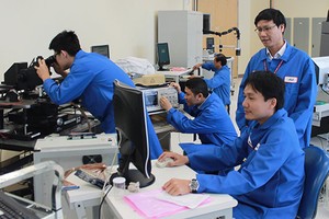 美國微軟集團技術員在本市高新技術園區工作。（圖源：廷民）