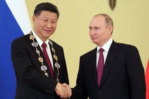 中俄兩國元首互致新年賀電。習近平：回首2017年，中俄全面戰略協作夥伴關係在高水準上取得新的重要發展。（示意圖源：新華網）