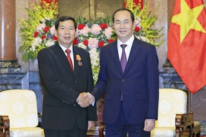 國家主席陳大光(右)接見西提丹帕院長。