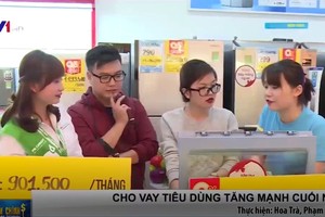 據國家財政監察委員會的財政市場總體報告顯示，去年的消費信貸約增65%，繼續比前年的50.2%高。（圖源：VTV視頻截圖）