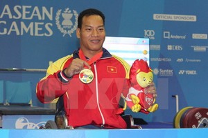 越南殘疾運動員黎文功。