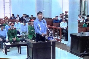 被告丁羅昇出庭受審。