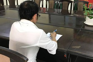 被抓獲的嫌犯阮黃T。