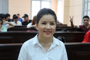 當聽到勝訴的判決，玉貞禁不住露出了滿意的笑容。（圖源：勇靈）